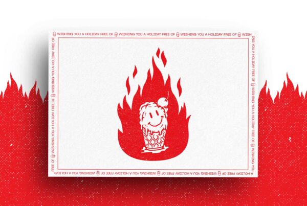 Front side of card featuring an illustration of a smiling ice cream cone that's on fire.